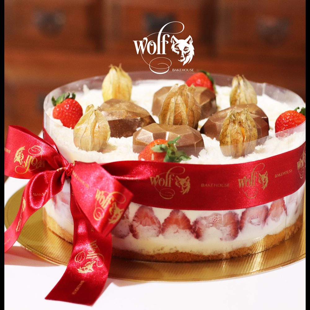 Celebration cake with chocolate gems by Milene Pereira at Wolf Bakehouse